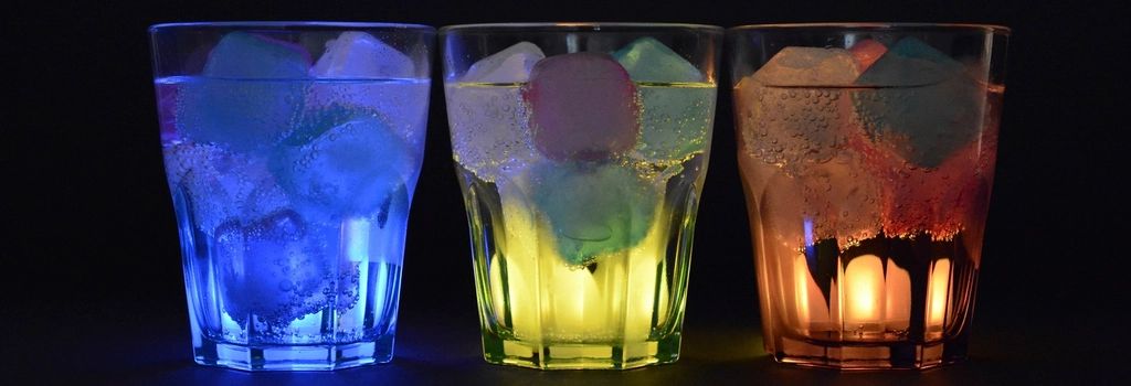 A cocktail being finished at the bar