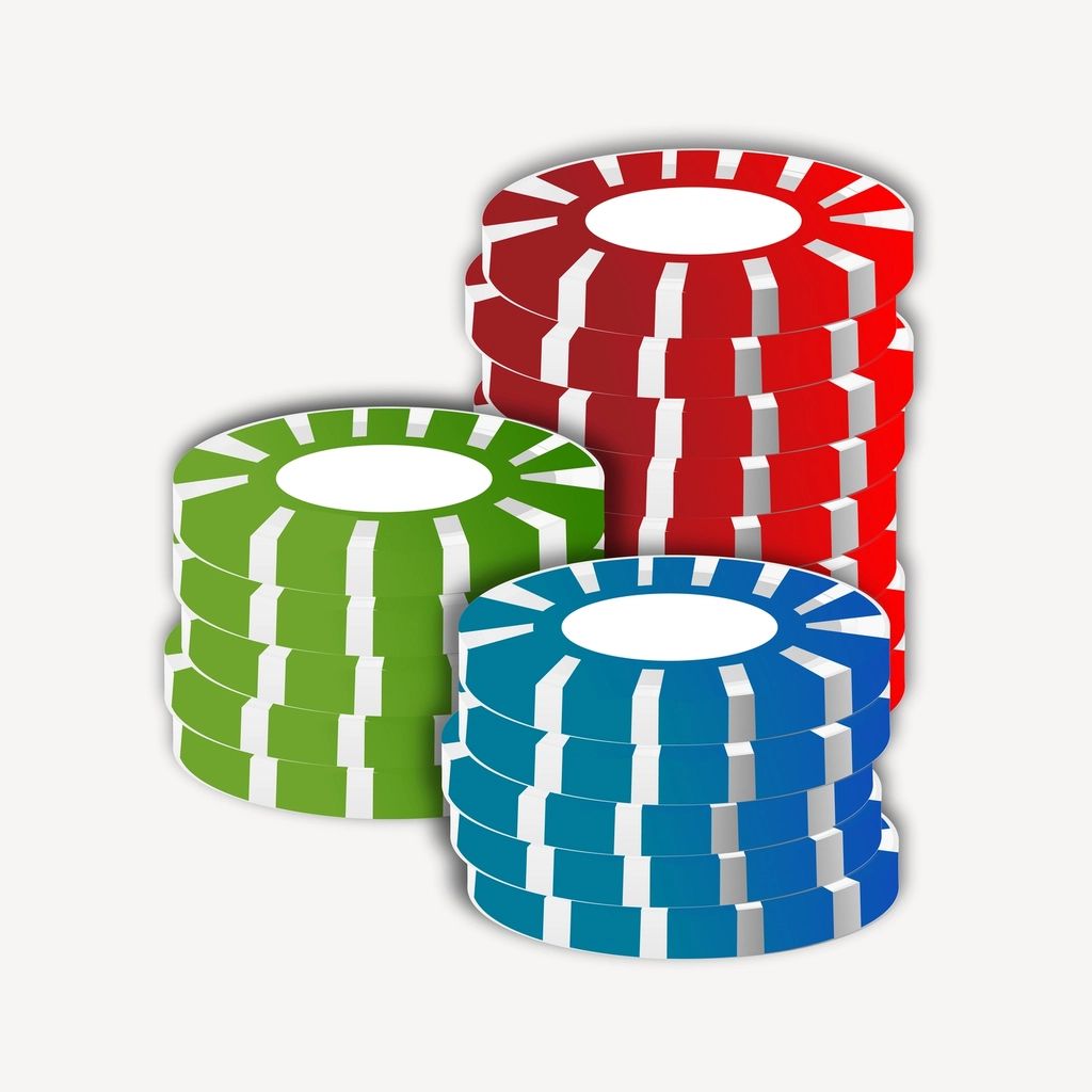 Gaming chips and cards on the table felt
